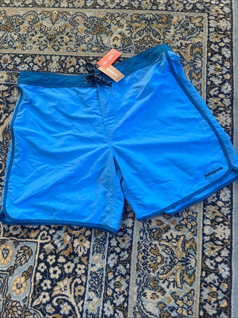 Patagonia Men’s Bright Blue Swim Board Shorts with Dark Blue Trim